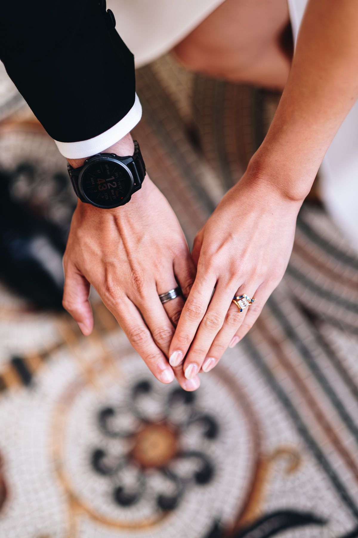 Close-up shots of hands wearing wedding rings taken by Melbourne couples photographer during a registration of marriage photo session.