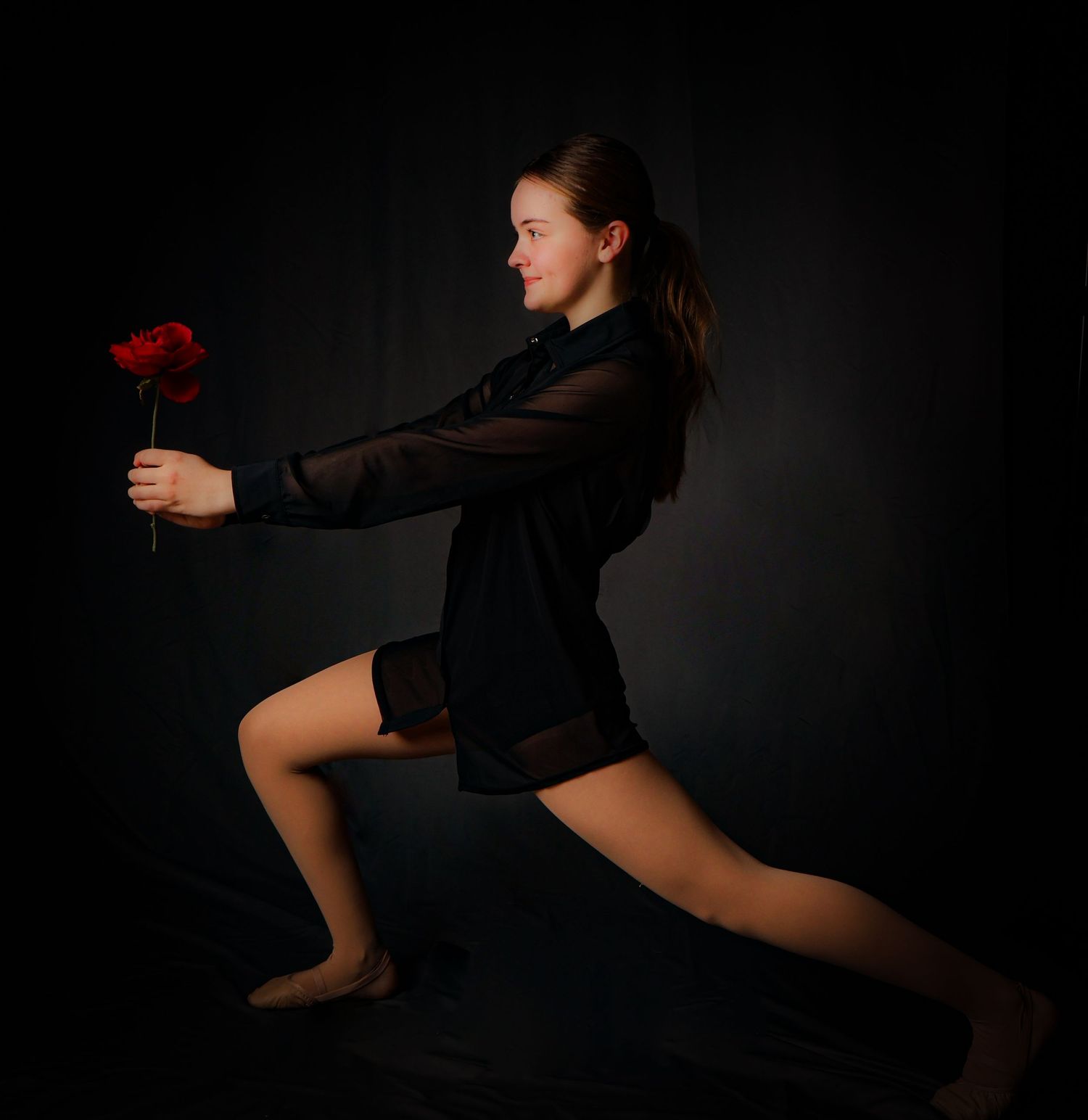 A dancer in dark attire strikes dynamic poses against a black background, showcasing graceful movement and form.