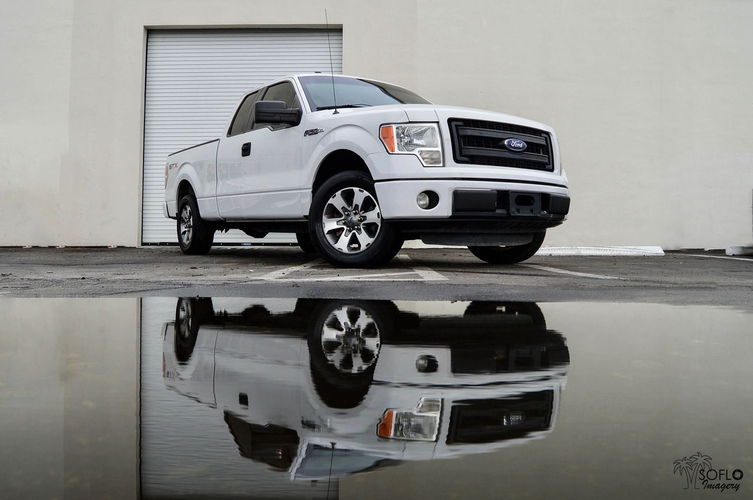 Five sequential shots of a white pickup truck shown from different angles with artistic reflection effects in the last frame.