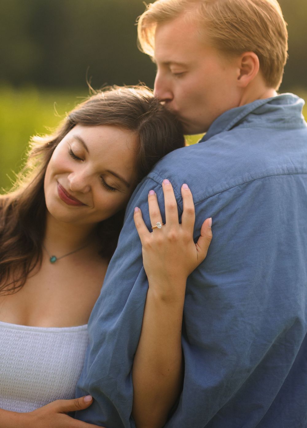 Intimate close-up shots showing tender embraces between two people against a soft natural background.