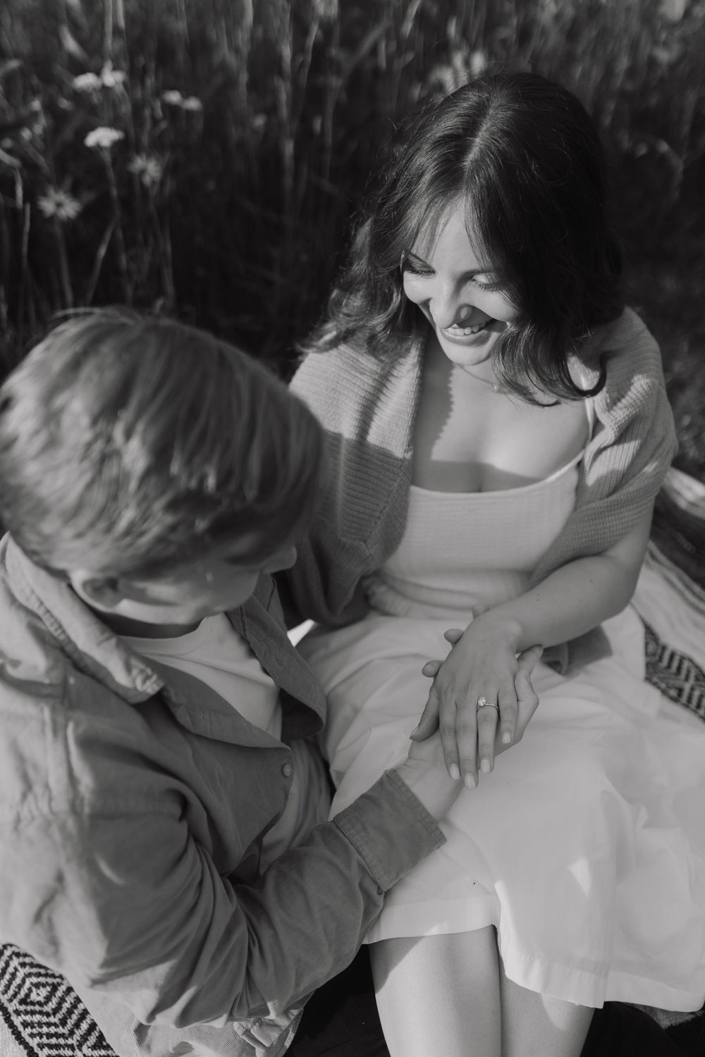 Intimate black and white photograph showing tender moments between two people in a sequence of close shots.