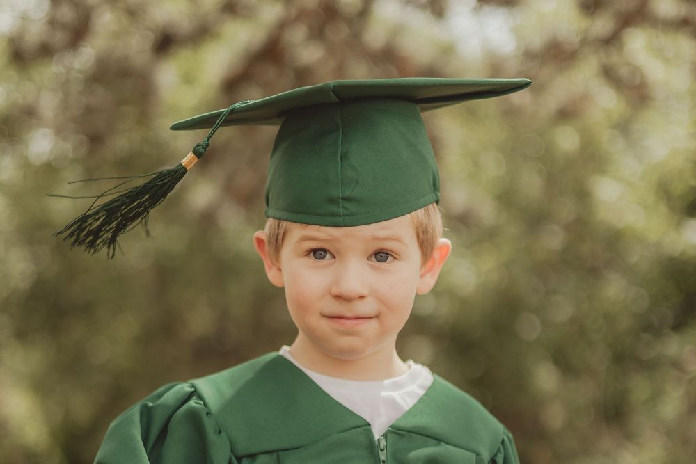 nursery graduation / pre-school graduation with gown and cap - outdoor on tooting common