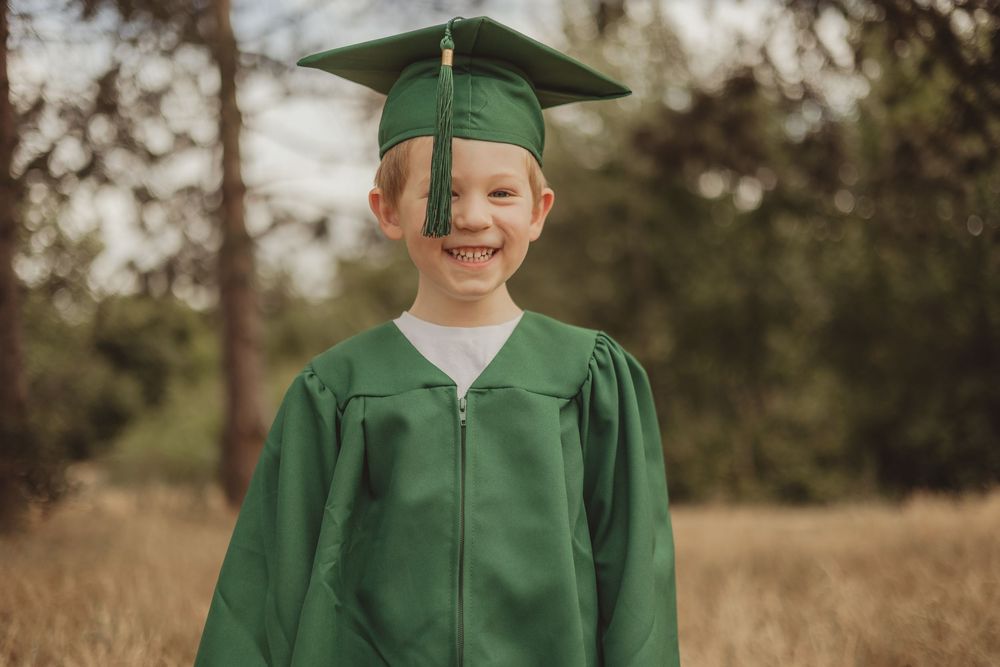 nursery graduation / pre-school graduation with gown and cap - outdoor on tooting common