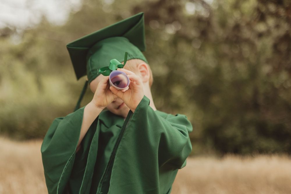 nursery graduation / pre-school graduation with gown and cap - outdoor on tooting common
