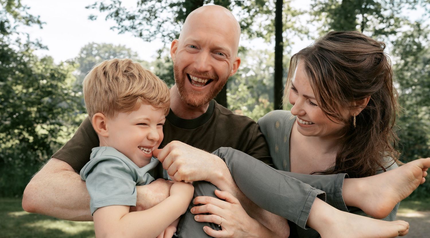 Candid family moments showing playful interactions and laughter.