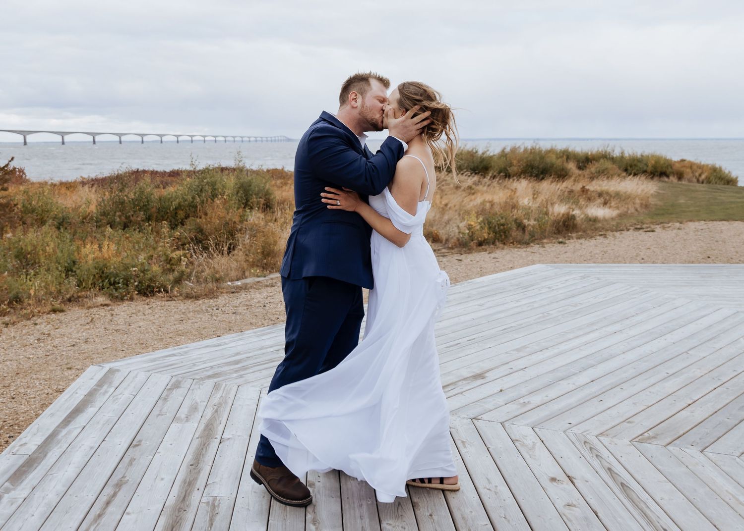 Elegant bridal portraits with the groom standing behind, hands wrapped around her waist. Romantic New Brunswick wedding portraits