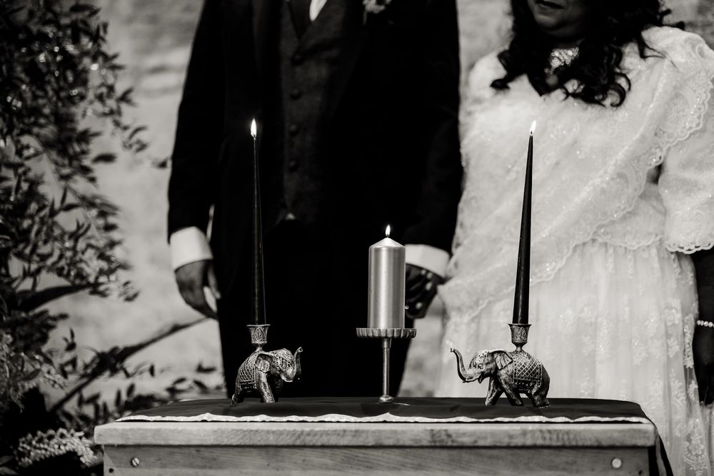 Vintage-style black and white photograph of a wedding couple in formal attire.