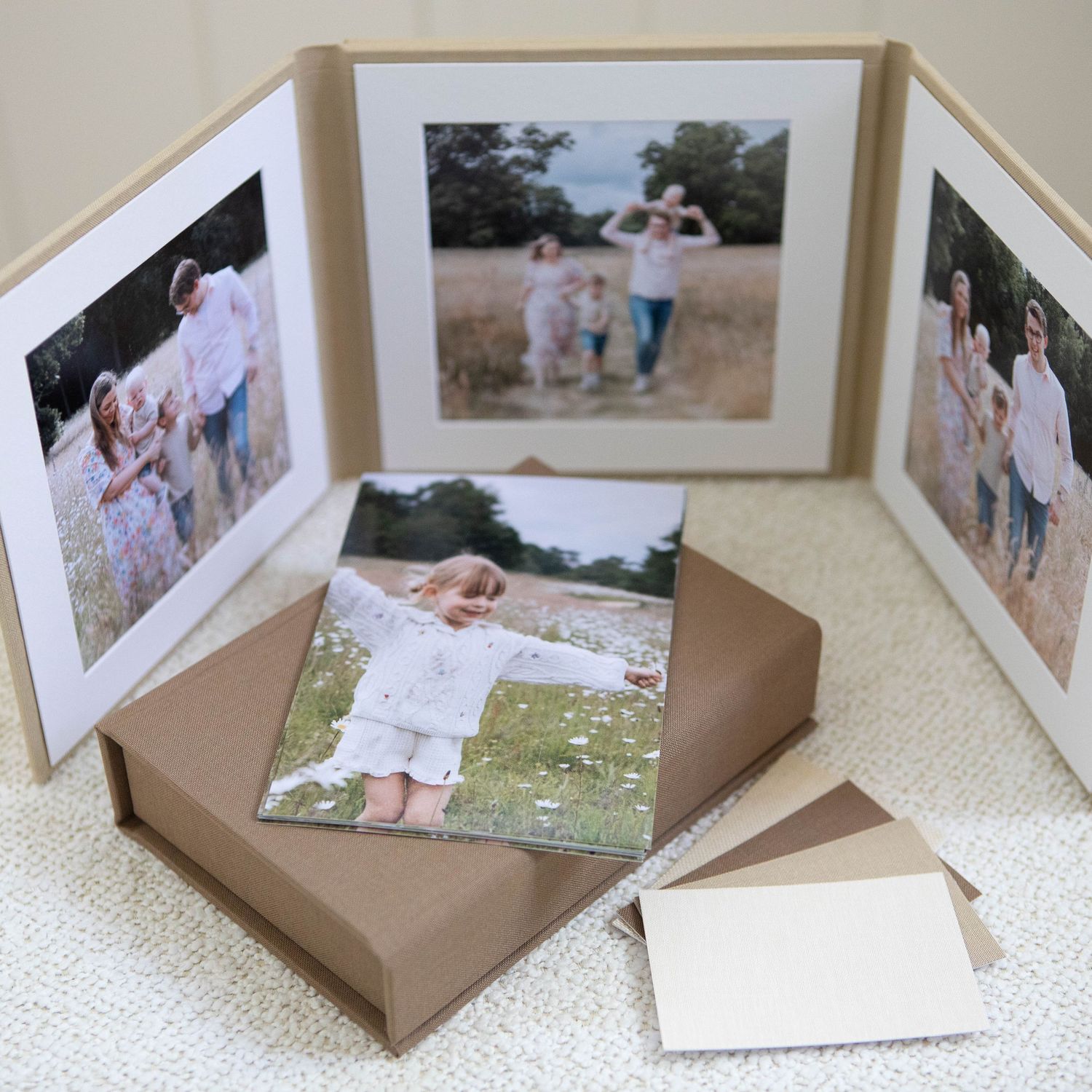 Printed photos with frame and linen box to show what products can be ordered.