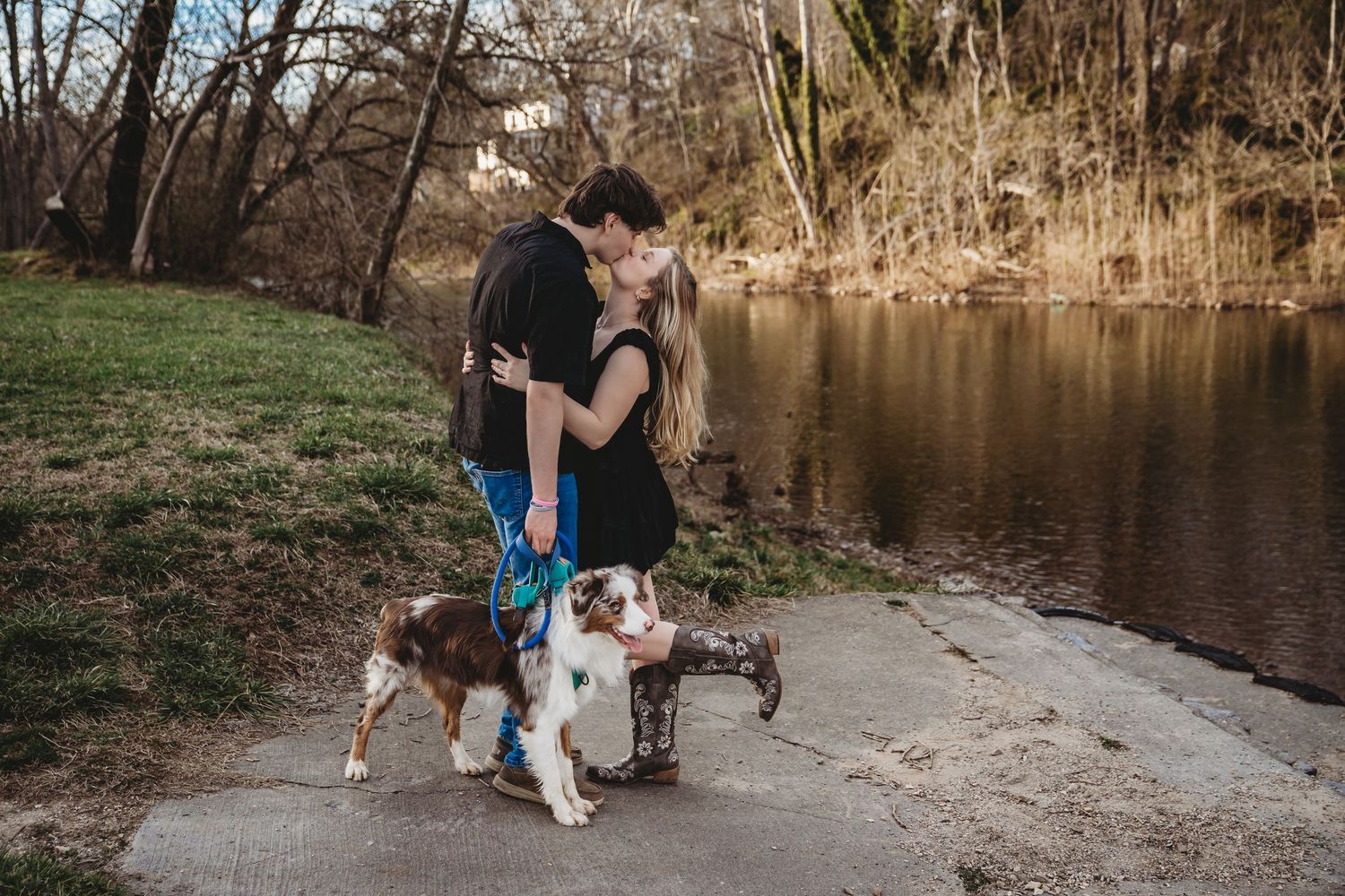 Romantic couples photos captured along a serene riverside path during golden hour.