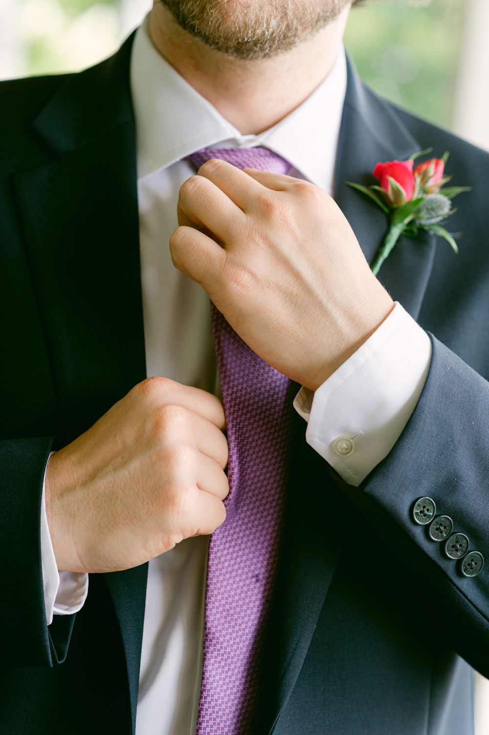 Close-up shots of formal attire showing purple tie adjustments and red boutonniere details.