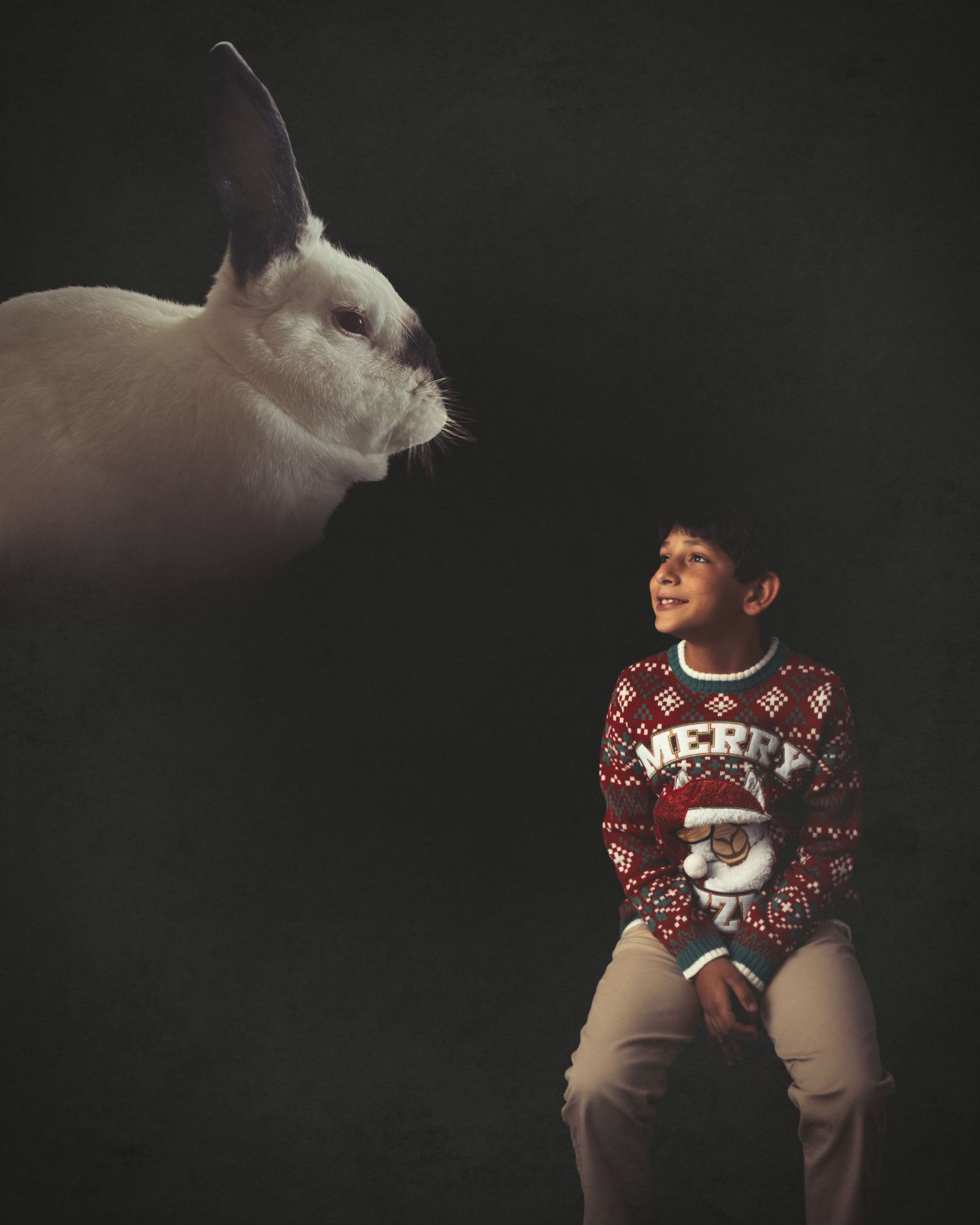 A festive holiday photo sequence showing someone posing in a red and white Christmas sweater against a dark background.