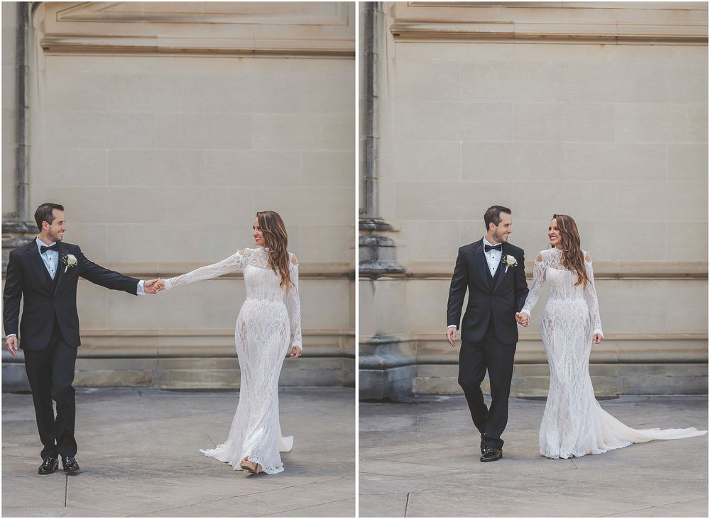 A couple in wedding attire pose in a sequence of playful movements along a beige wall.