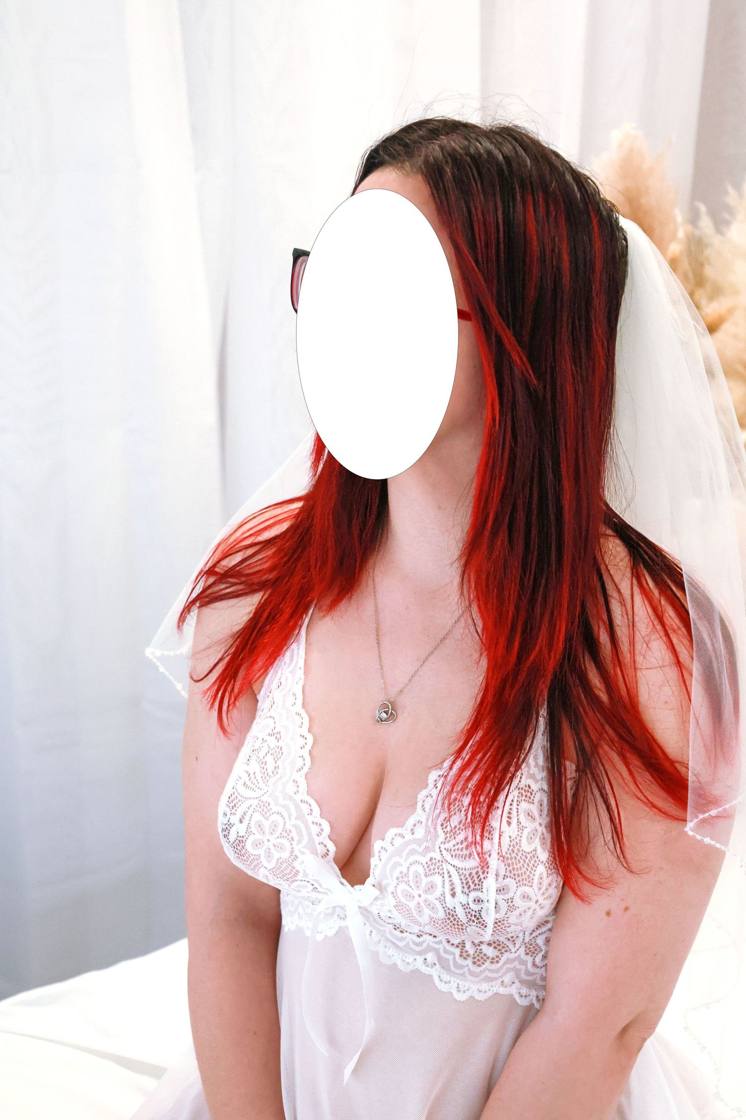 Romantic boudoir photography series featuring white lace lingerie and soft lighting.
