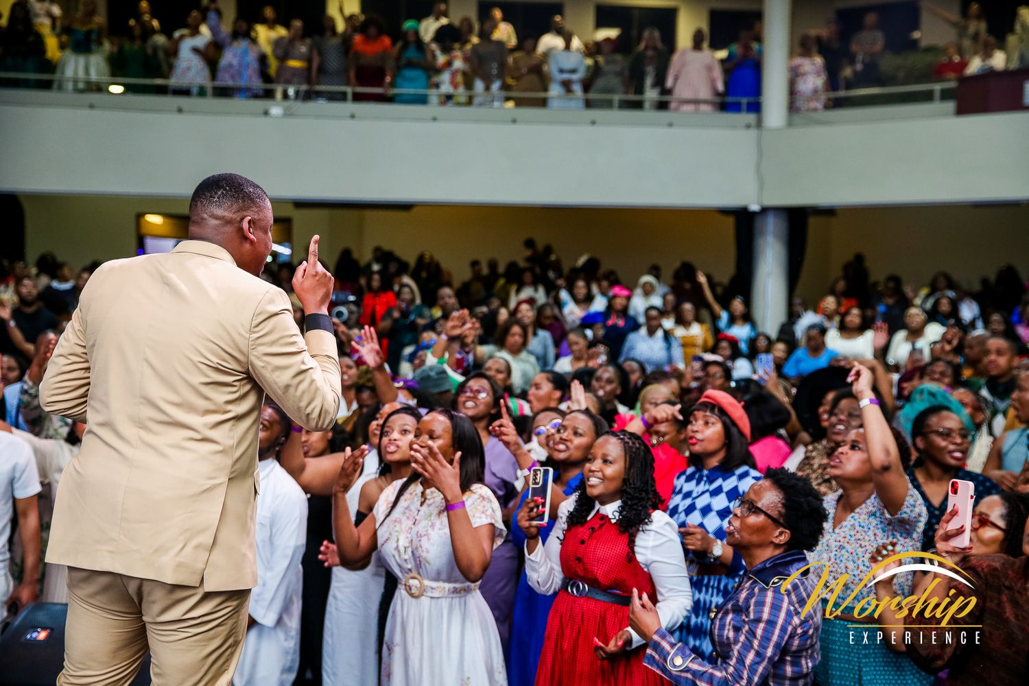 Lead vocalist ministering powerfully during a high-energy worship moment.
