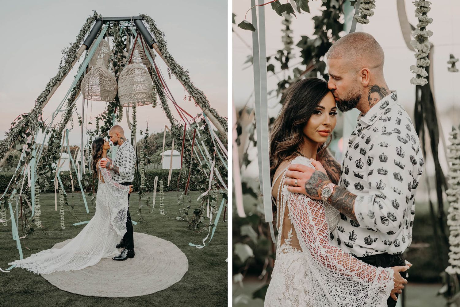 Wedding couple embraces under a romantic outdoor ceremony arch decorated with floral arrangements and hanging lanterns.
