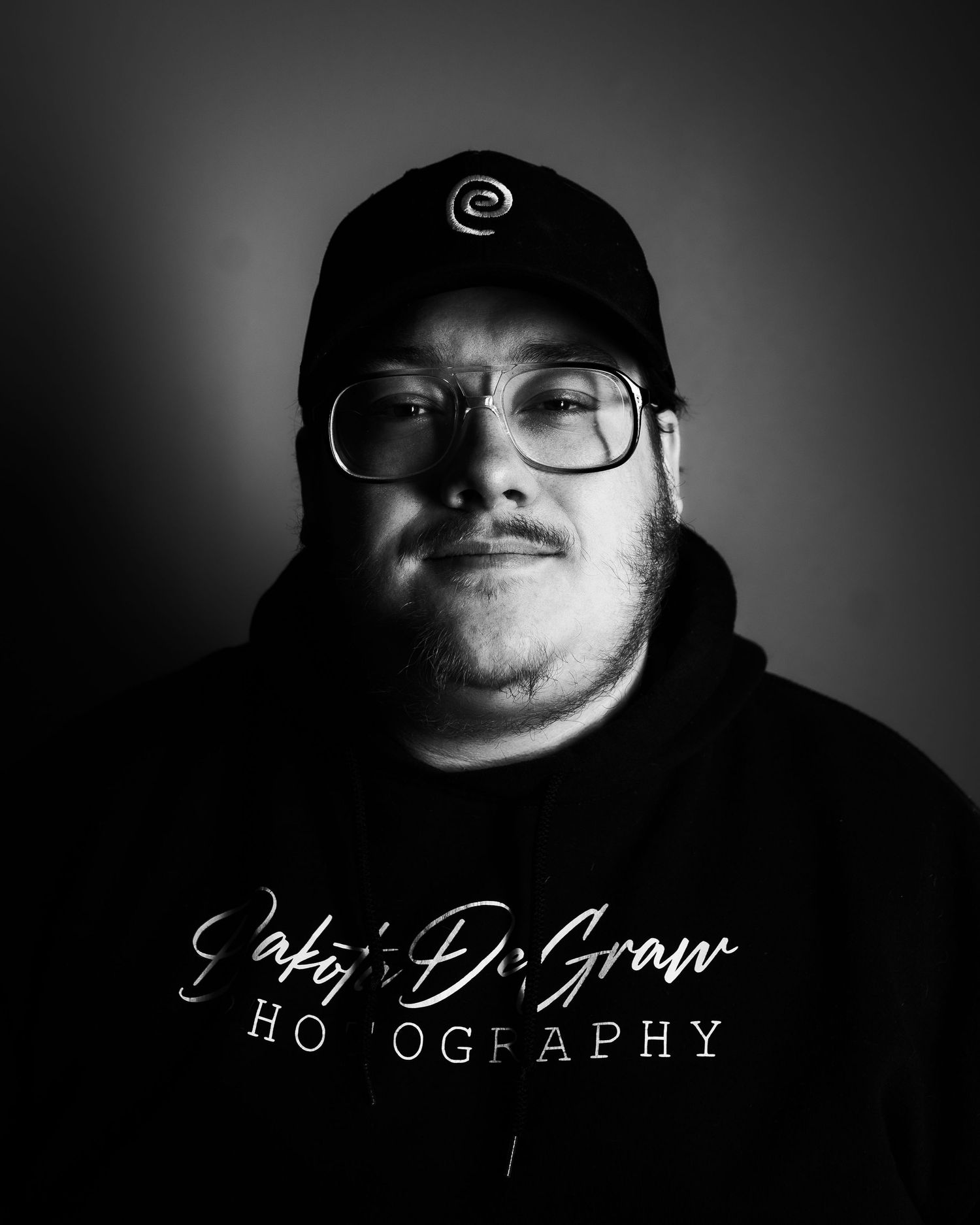 Owner of DeGraw Media, Dakota, smiling into the camera