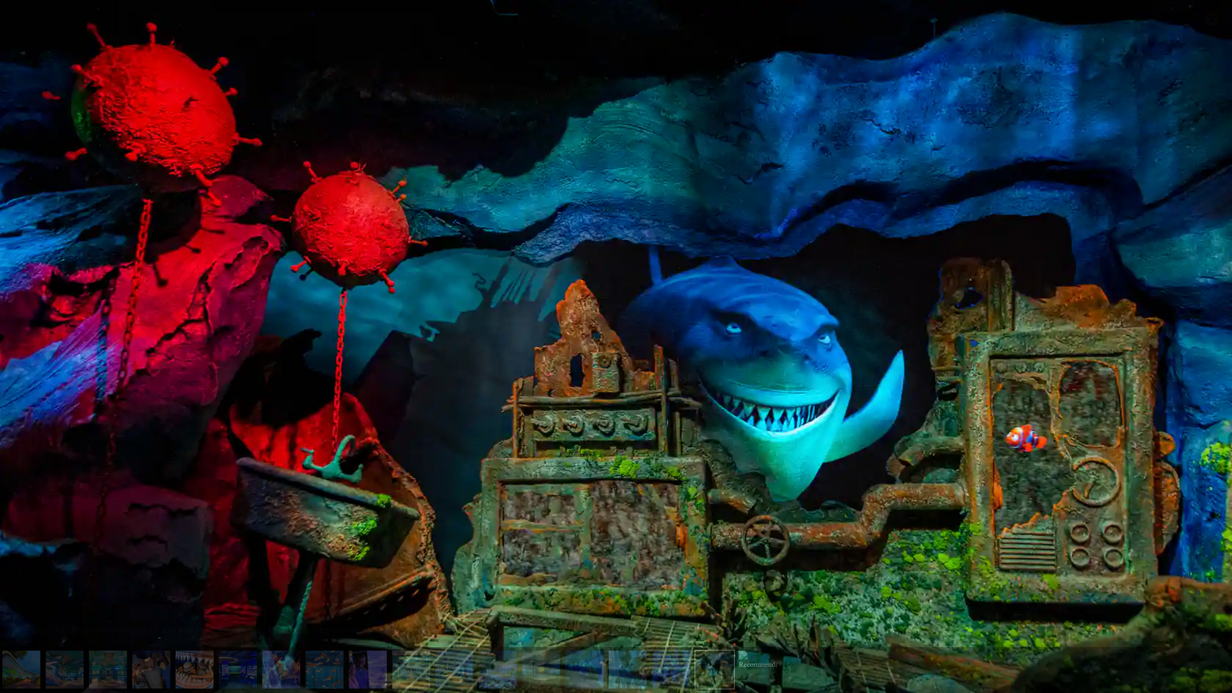 Animated movie scene showing a dark moody interior with items arranged on wooden shelves in eerie lighting.