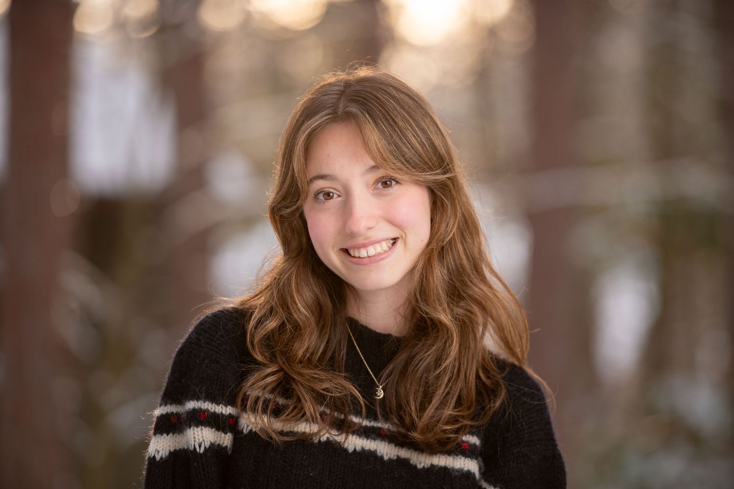 Indoor portrait series with soft lighting and warm tones creating cozy atmosphere.