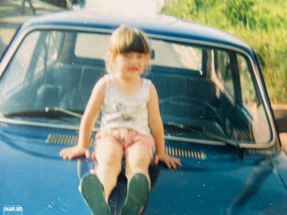A series of vintage photographs showing someone entering a car on a sunny day in the 1960s.
