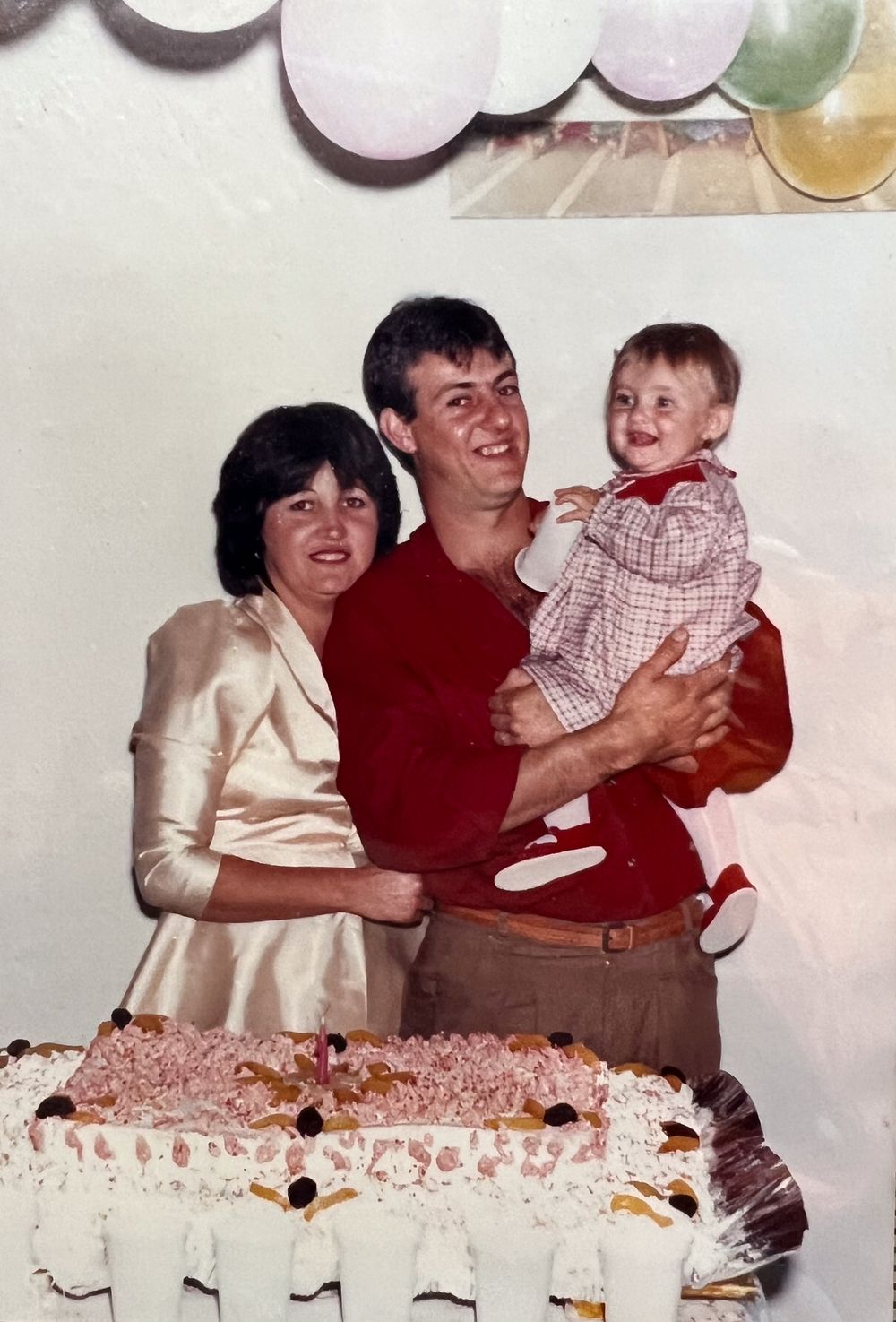 A family celebrates with a birthday cake in a series of vintage photographs showing joyful moments together.