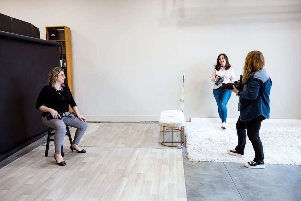 A sequence of photos showing someone sweeping a white floor with a broom in an empty gallery-like space.