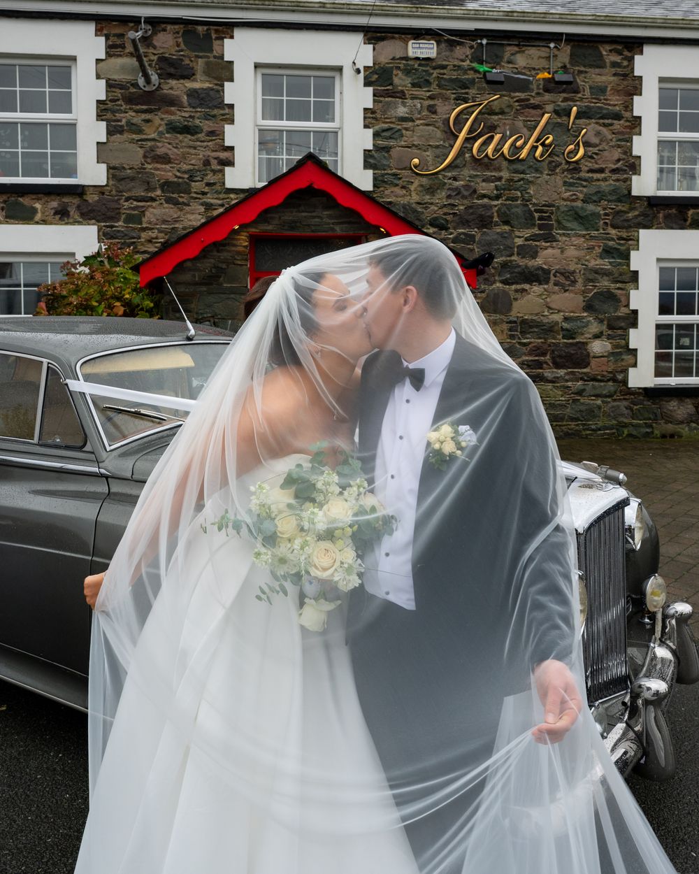 Bride and Groom kissing in Killorglin, County Kerry.
