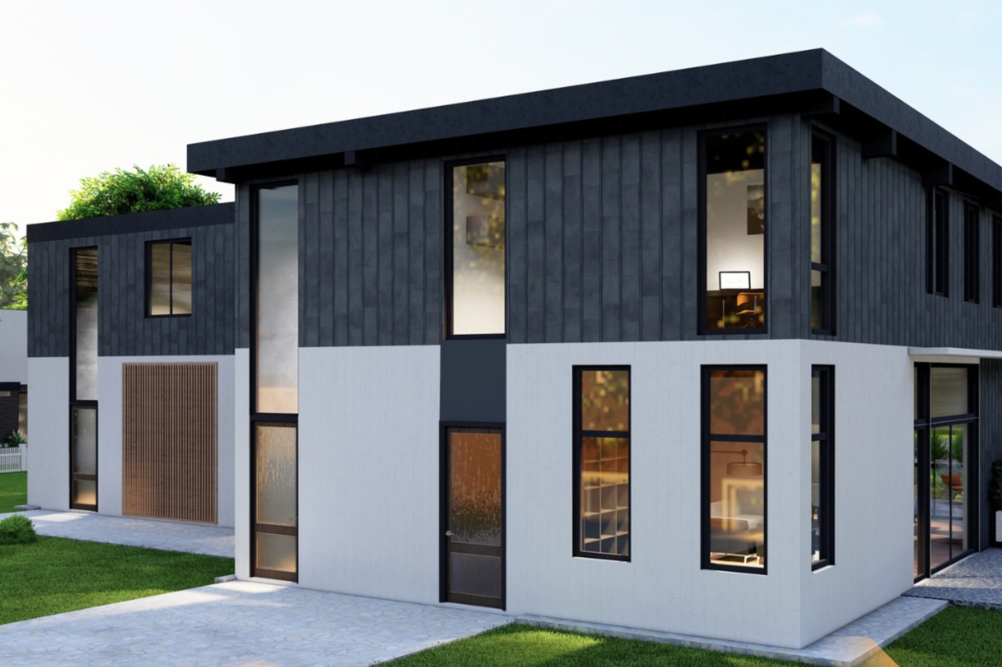 Modern two-story house with black and white exterior featuring large windows and geometric design.