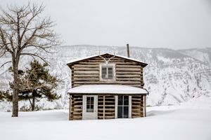 Cabin in the snow photographed by Chris Douglas.