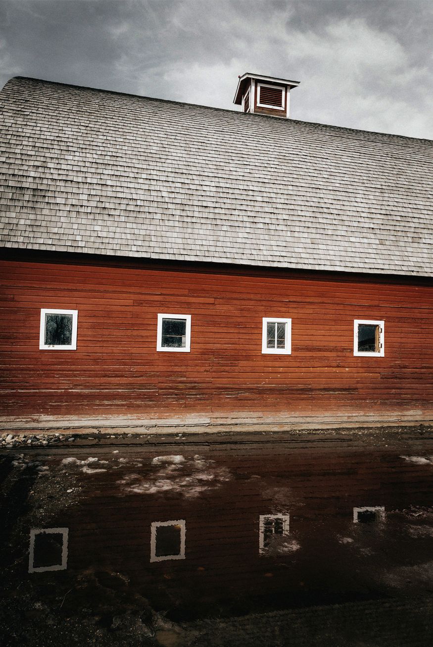 Red barn in Livingston, Montana photographed by Chris Douglas.