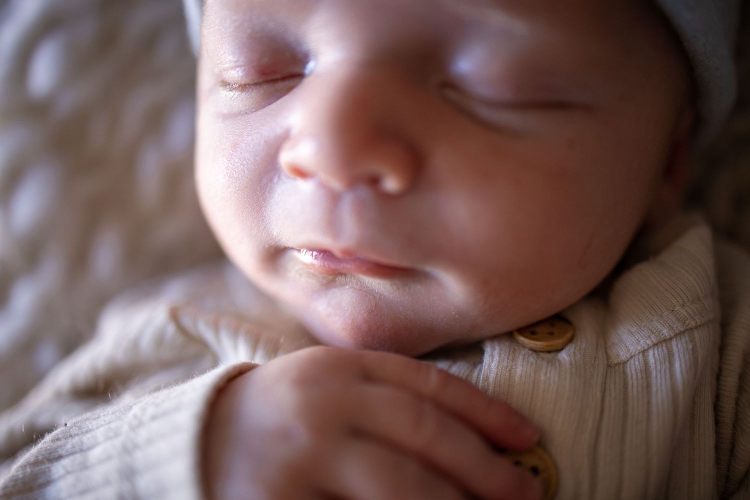 Springfield, IL Newborn Photographer captures a close up of a newborn's eyes, nose and mouth during a newborn session in Central IL
