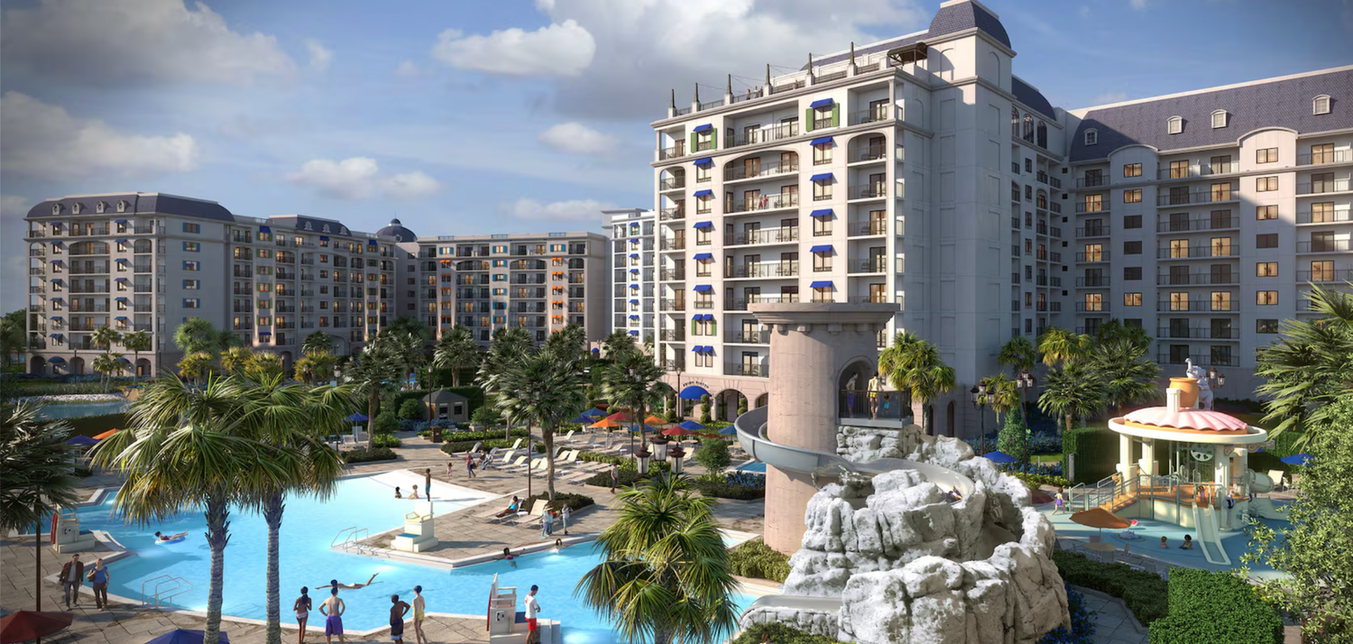 Luxury resort exterior with swimming pools, palm trees and modern high-rise buildings.