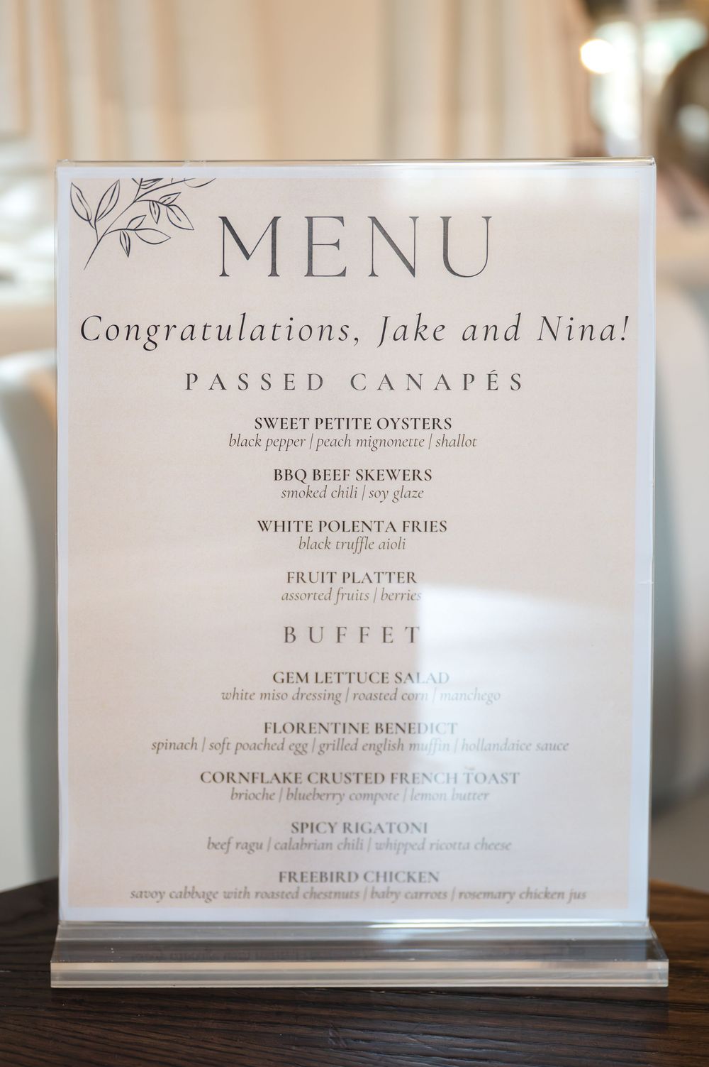 Elegant wedding menu card congratulating Jake and Nina with buffet and canape options.