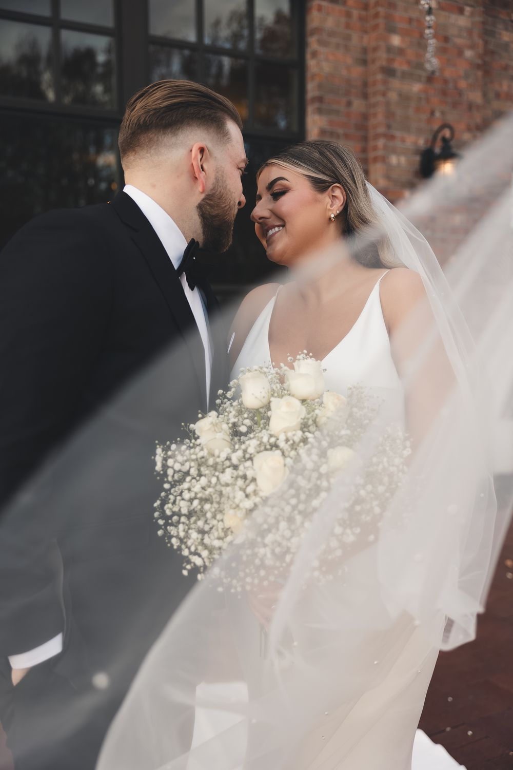 Romantic wedding portrait at The Everly in Mentor, Ohio. Modern, timeless photography capturing natural moments and elegant bridal details.