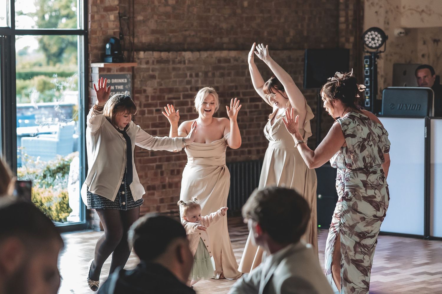 Documentary wedding guest moments on the dance floor.