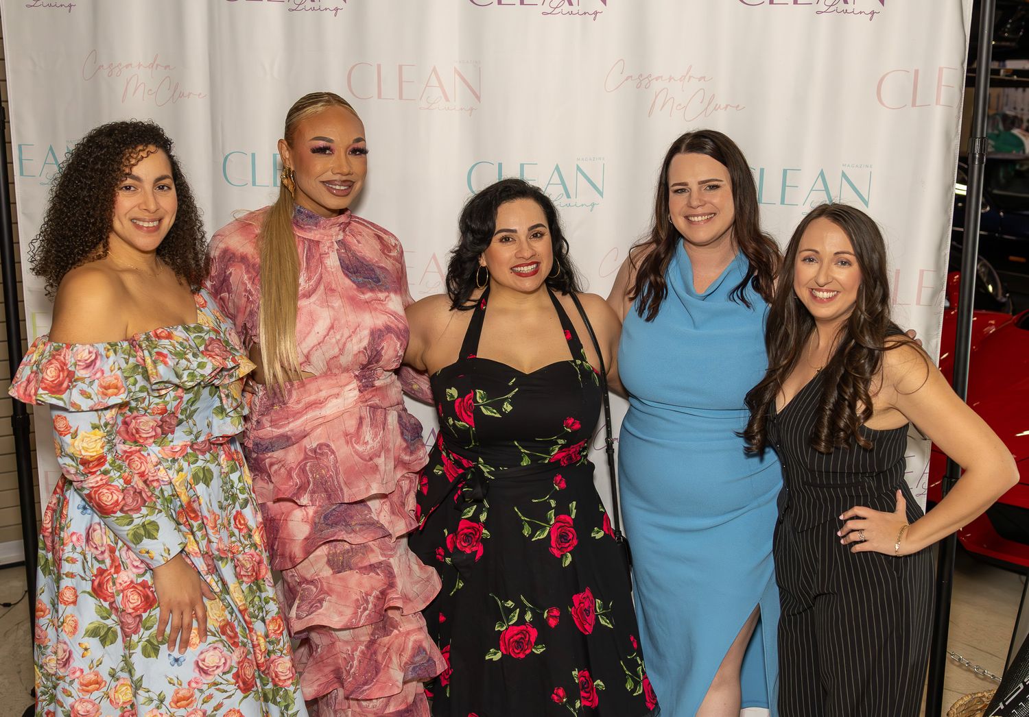 Group portrait captured during a luxury Bay Area lifestyle event by Raymond C. Hansell Photography.