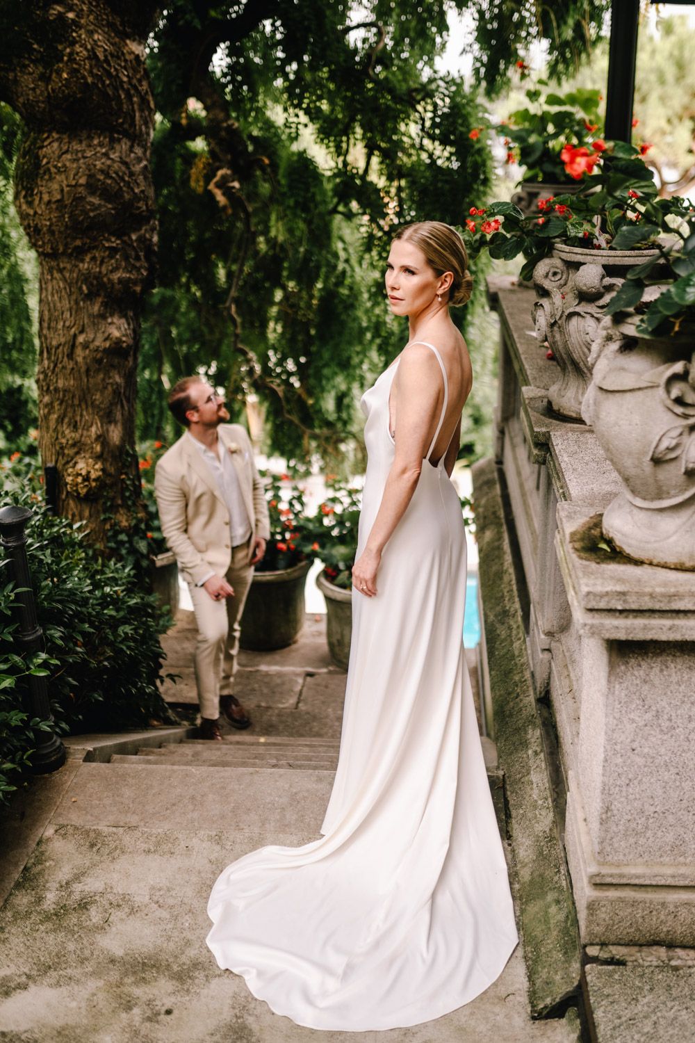 Finnish bride and groom during their romantic photo session in the lush hotel gardens