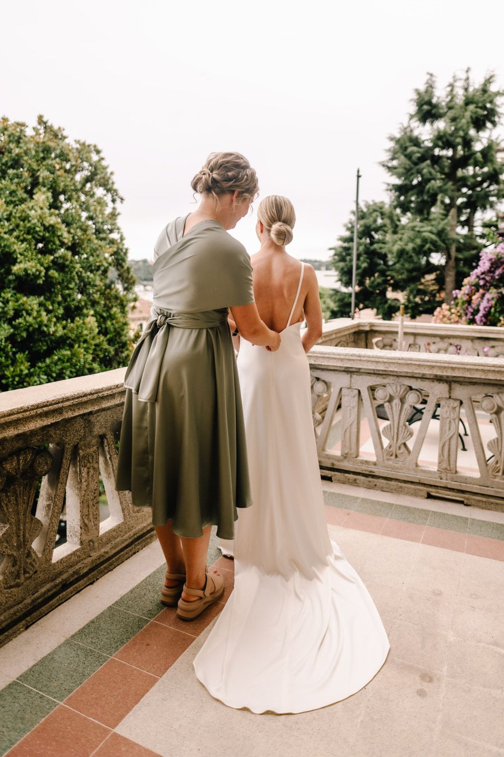 Bride getting ready at an Art Nouveau hotel overlooking Lake Garda