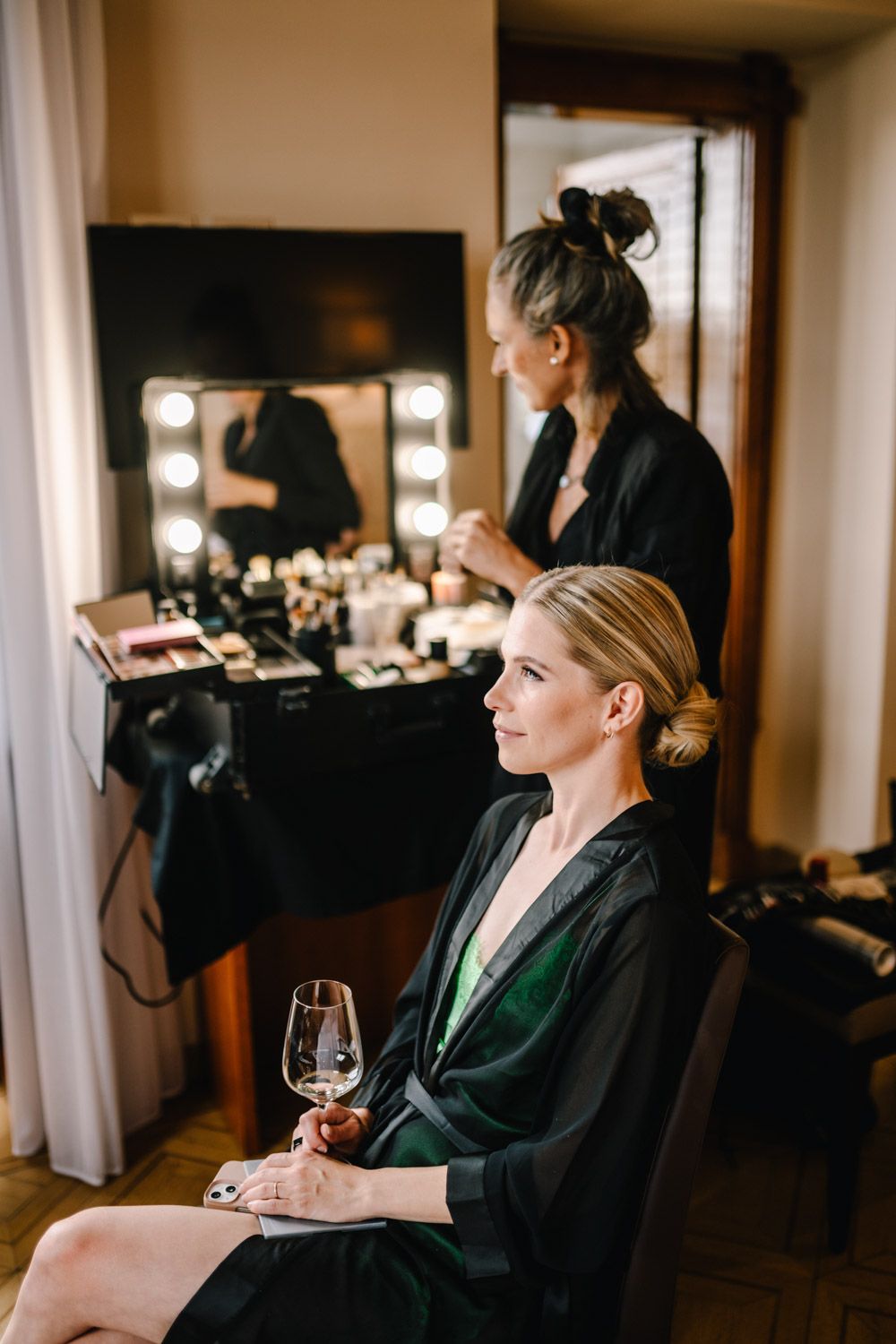 Bride getting ready at an Art Nouveau hotel overlooking Lake Garda