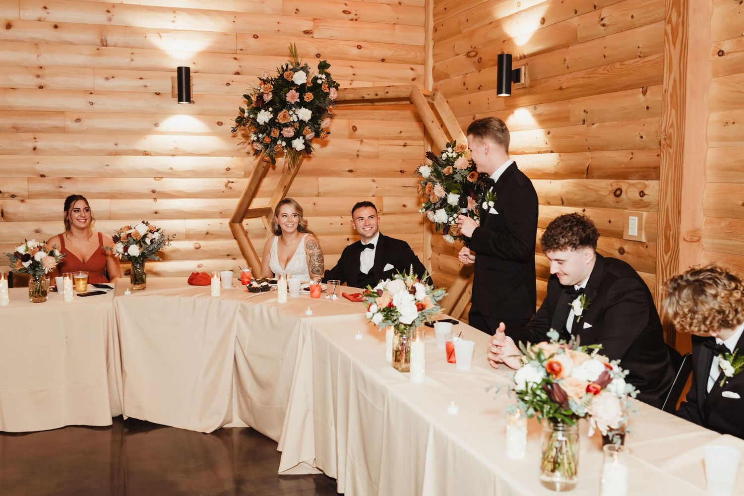 Best man giving the toast at the reception