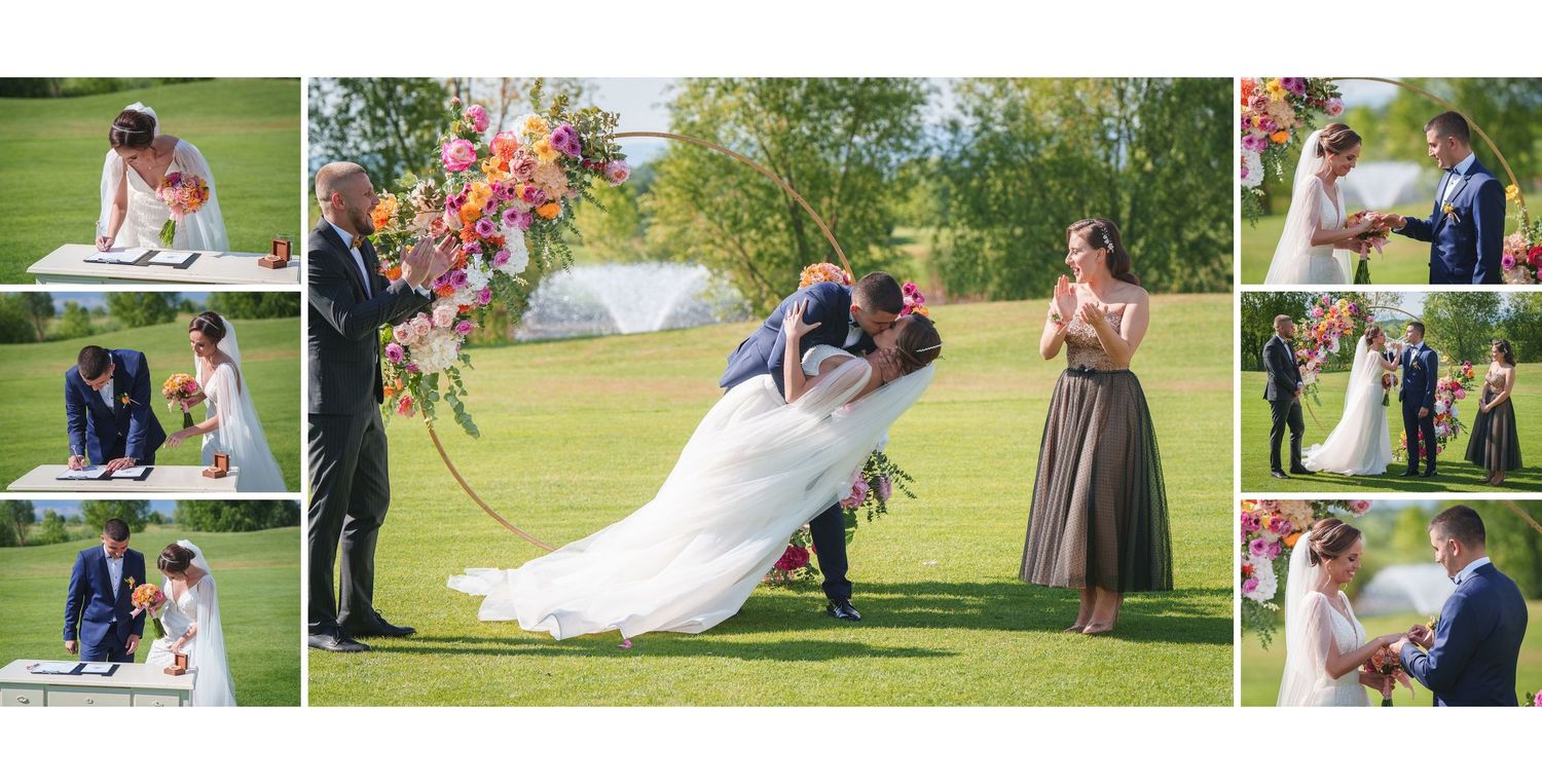 Bride and groom share a romantic dip kiss during outdoor wedding ceremony adorned with colorful floral arch.