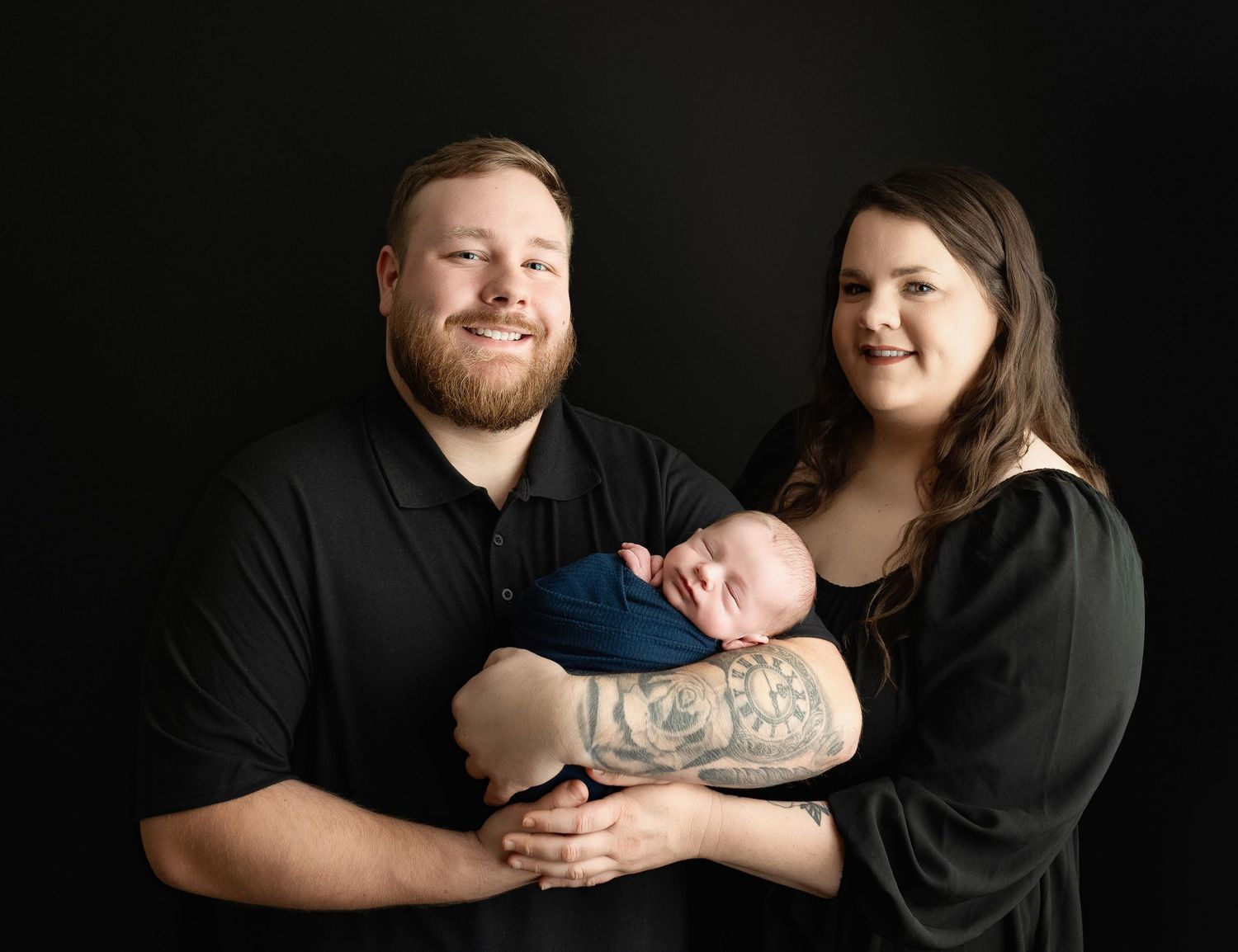 A sweet family holding their newborn boy. Greenville, SC newborn photographer, Easley SC newborn photographer, Upstate SC newborn photograph
