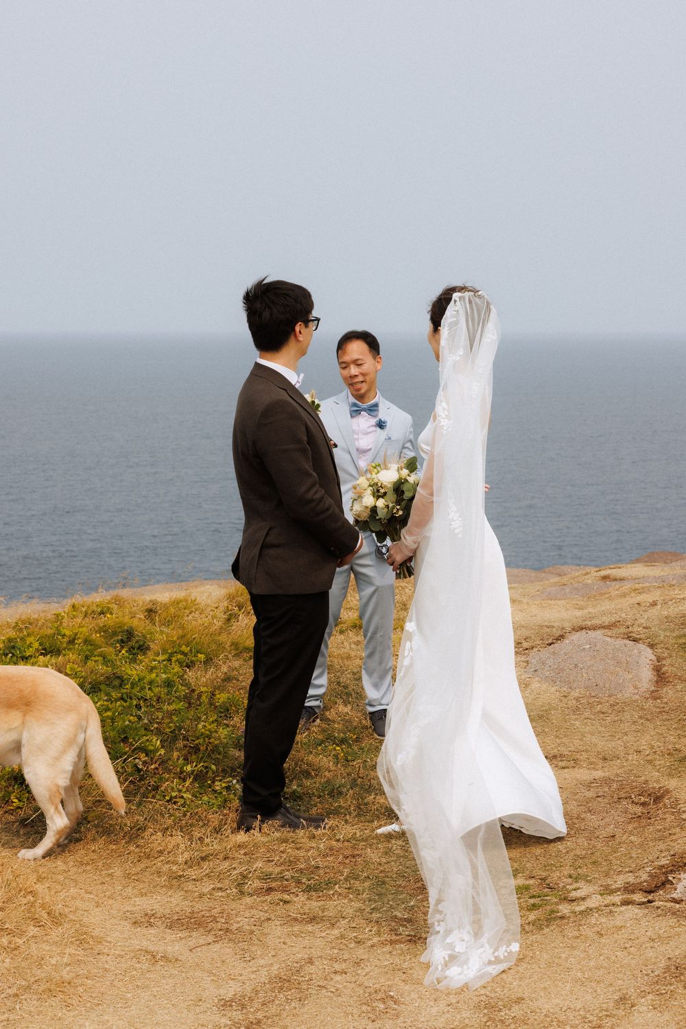 Elopement at Torbay Point captured by Newfoundland documentary style wedding photographer Kaitlyn yvette