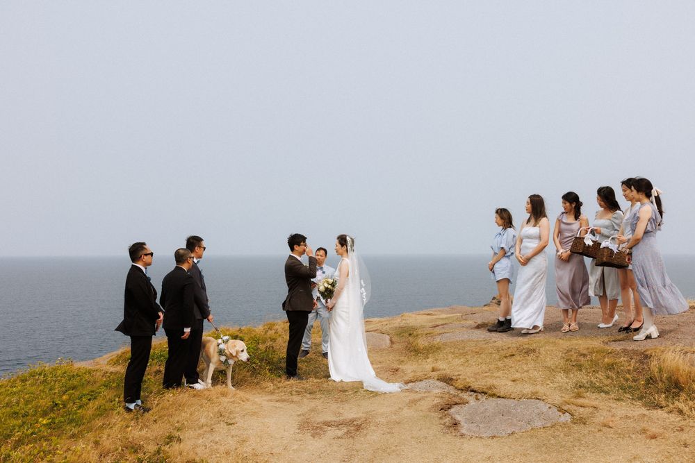 Wedding Ceremony at Torbay Point on the East Coast Trail captured by Newfoundland documentary style wedding photographer Kaitlyn yvette