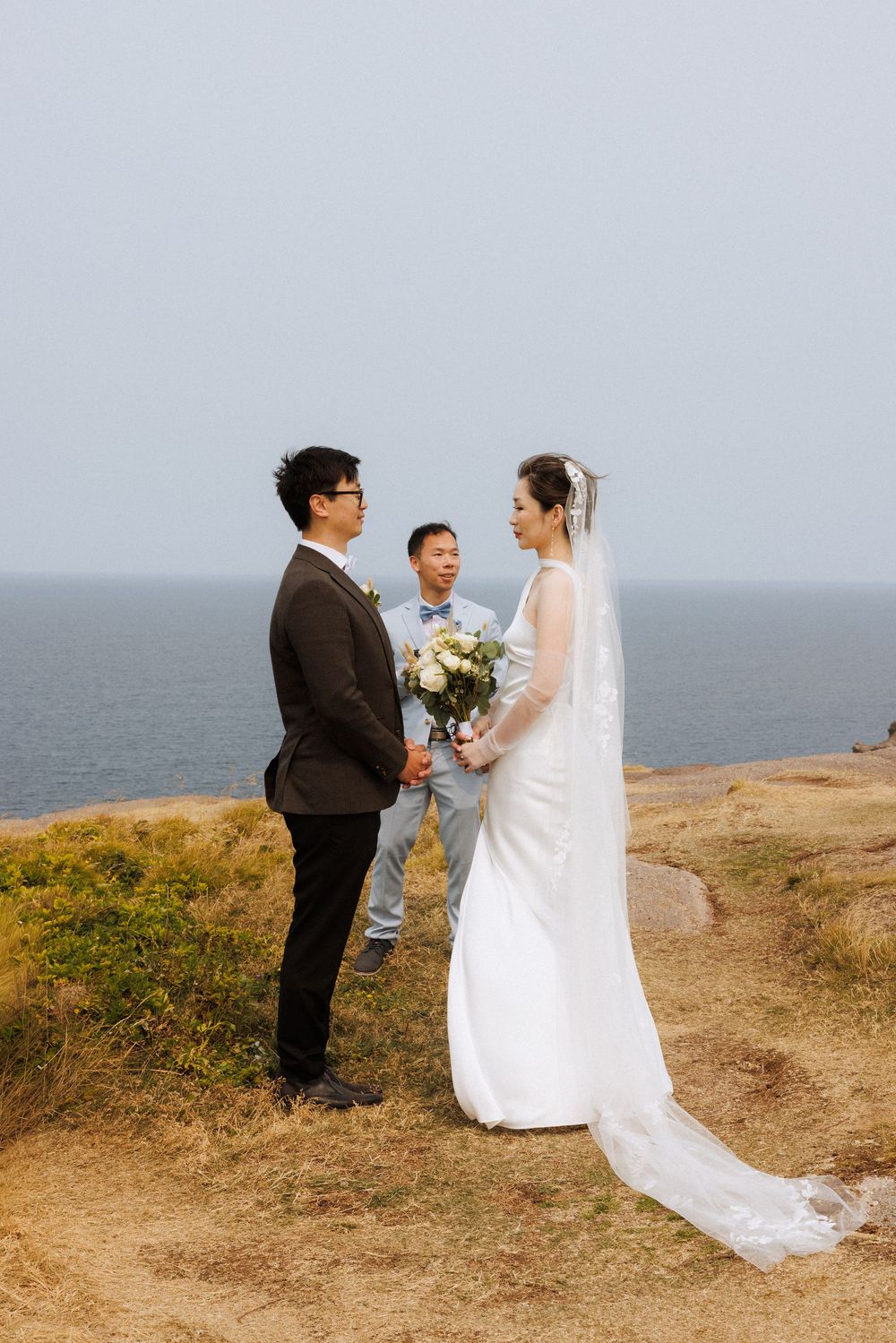 Elopement at Torbay Point captured by Newfoundland documentary style wedding photographer Kaitlyn yvette
