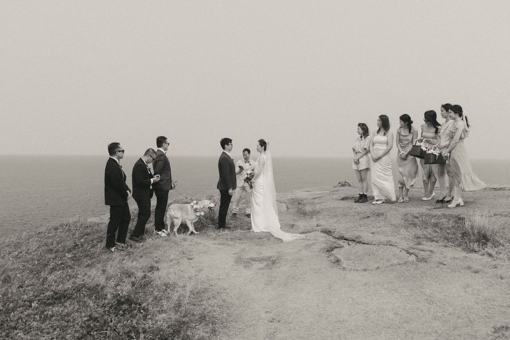 Wedding Ceremony at Torbay Point on the East Coast Trail captured by Newfoundland documentary style wedding photographer Kaitlyn yvette