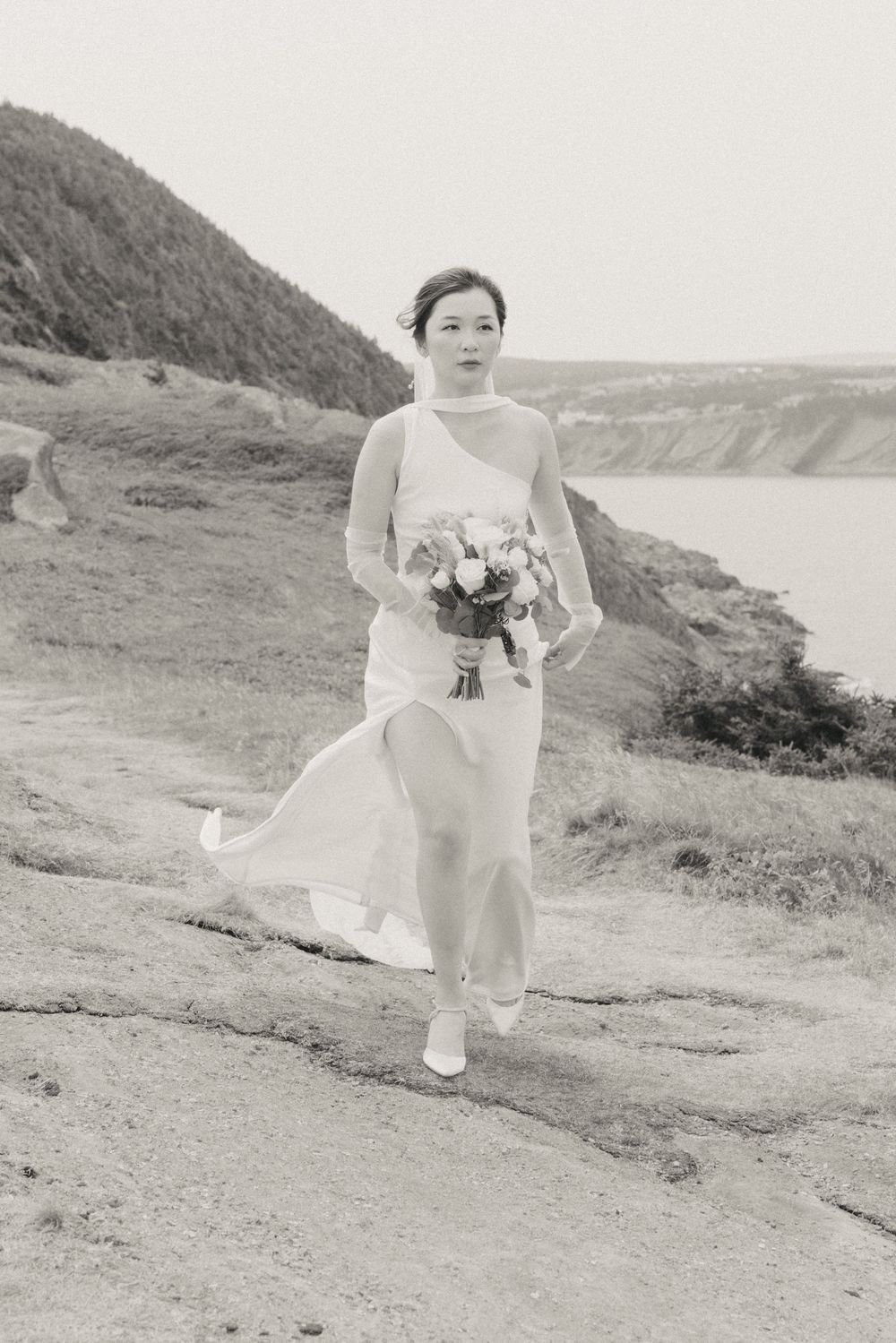 Wedding Ceremony at Torbay Point on the East Coast Trail captured by Newfoundland documentary style wedding photographer Kaitlyn yvette