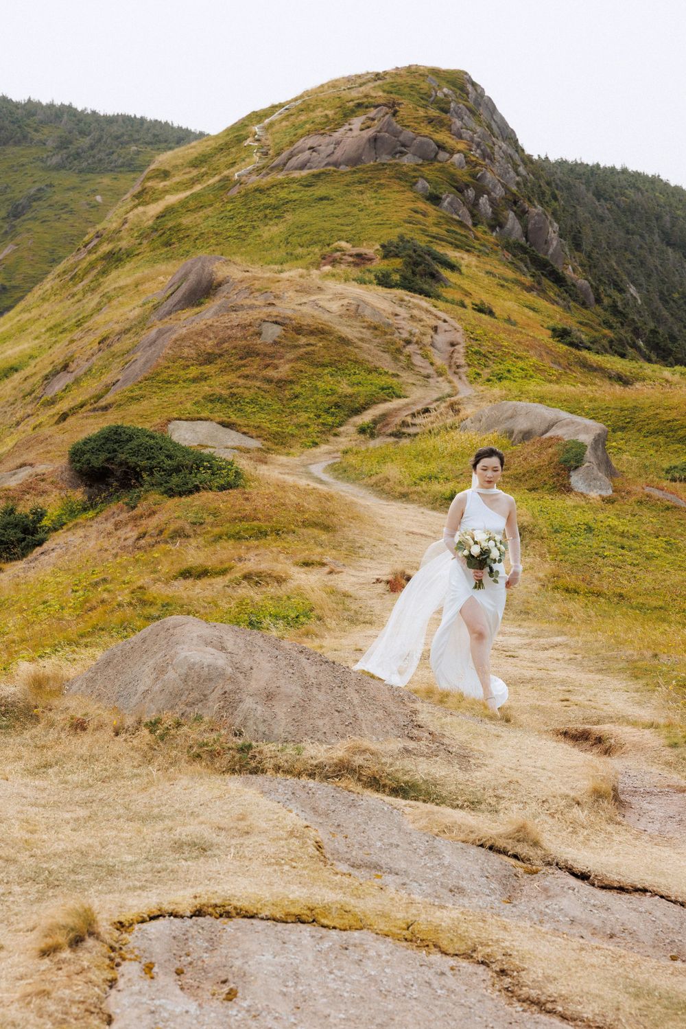 Wedding Ceremony at Torbay Point on the East Coast Trail captured by Newfoundland documentary style wedding photographer Kaitlyn yvette