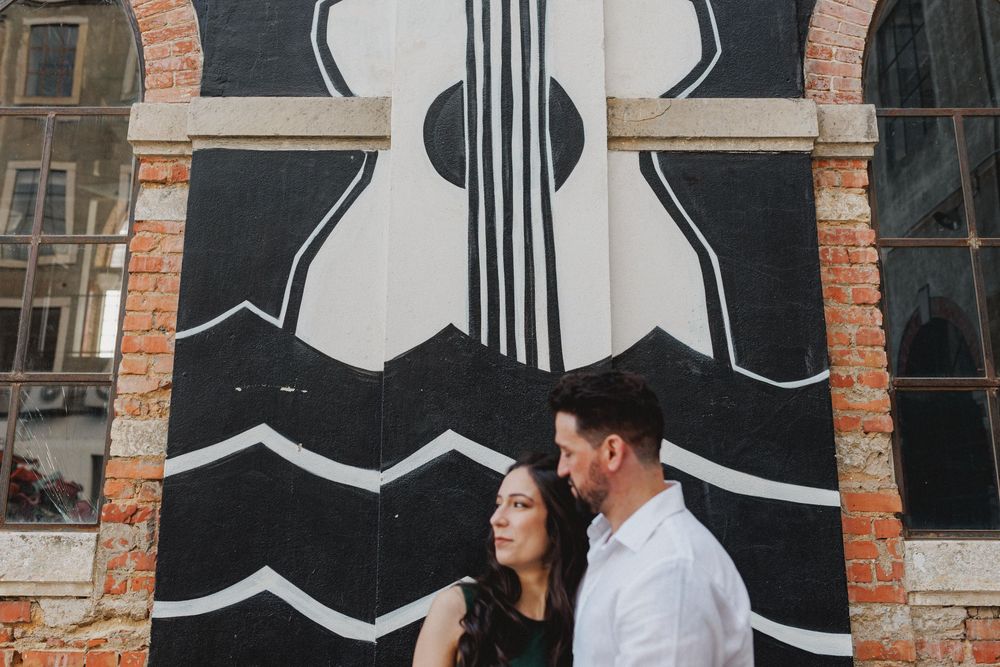 pre wedding photos in Lisbon LX Factory couple portrait with graphic wall and geometric patterns
