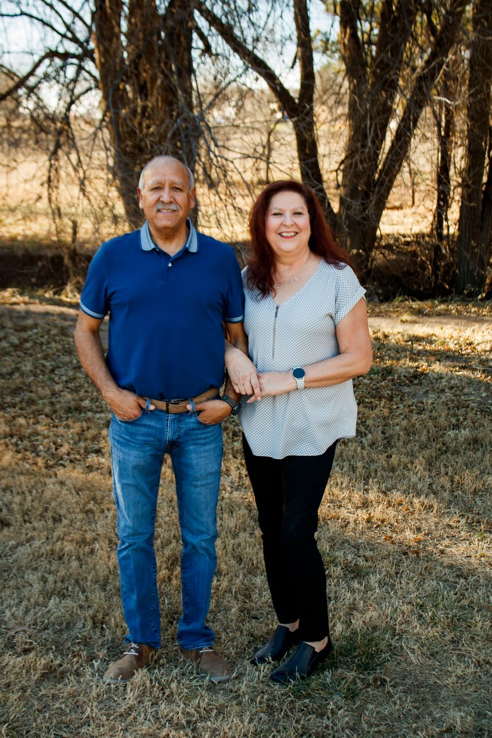 A couple during an extended family photo session at The League House in Amarillo, Texas