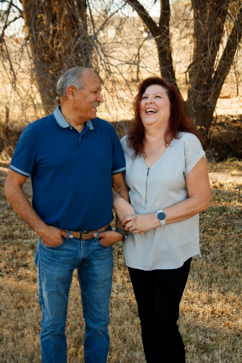 A couple during an extended family photo session at The League House in Amarillo, Texas